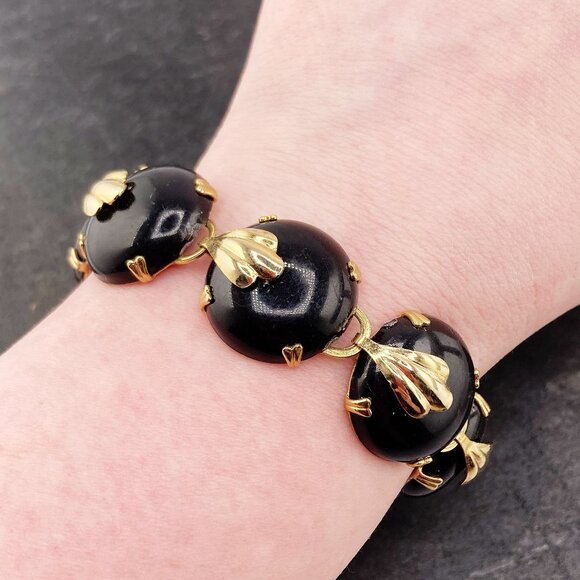 VINTAGE Black plastic and gold toned metal domed disk bracelet 1950s 1960s goth - Picture 1 of 11